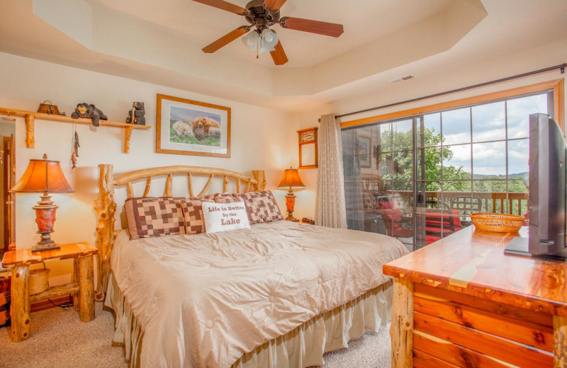 Guest bedroom at The Village At Indian Point Resort and Conference Center.