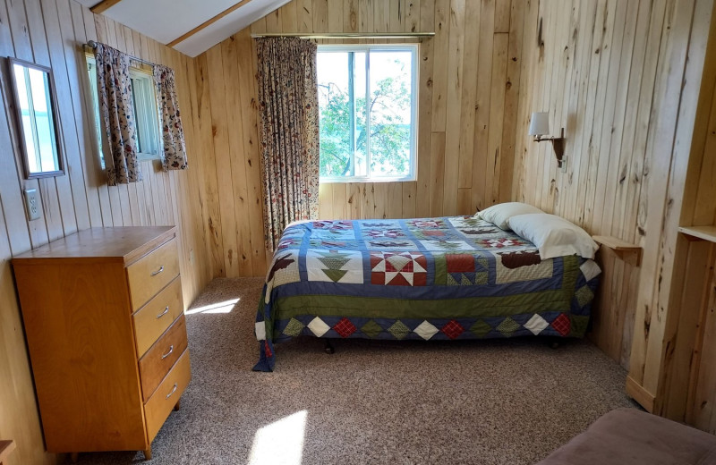 Cottage bedroom at Woodlawn Resort.