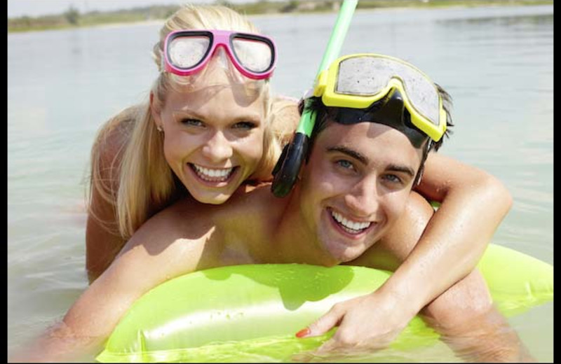 Couple diving at Northern Lake George Resort.