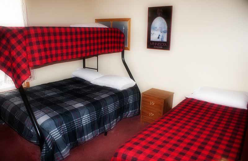 Cabin bedroom at River Bend's Resort & Walleye Inn.