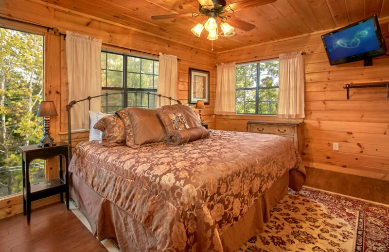 Cabin bedroom at Timber Tops Luxury Cabin Rentals.