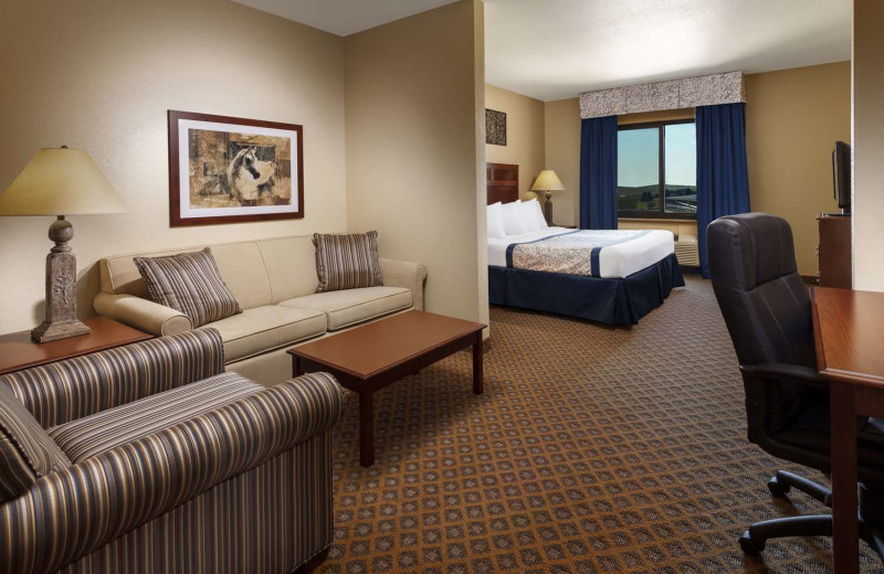 Guest room at  Roosevelt Grand Dakota, SureStay Collection by Best Western.