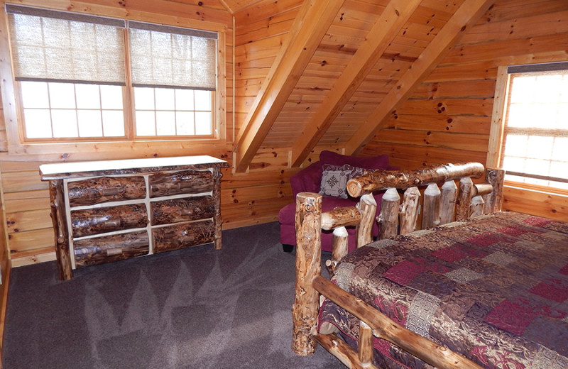 Cabin bedroom at Cut Above Cabins.