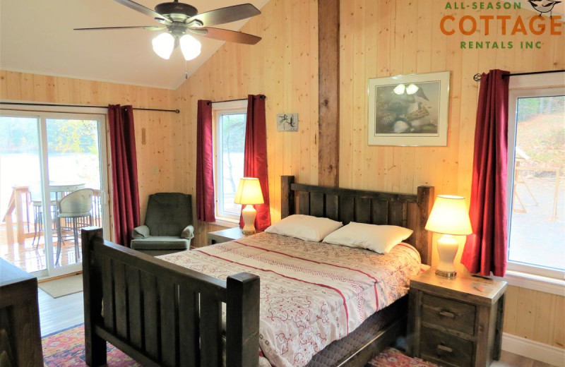 Rental bedroom at All-Season Cottage Rentals.