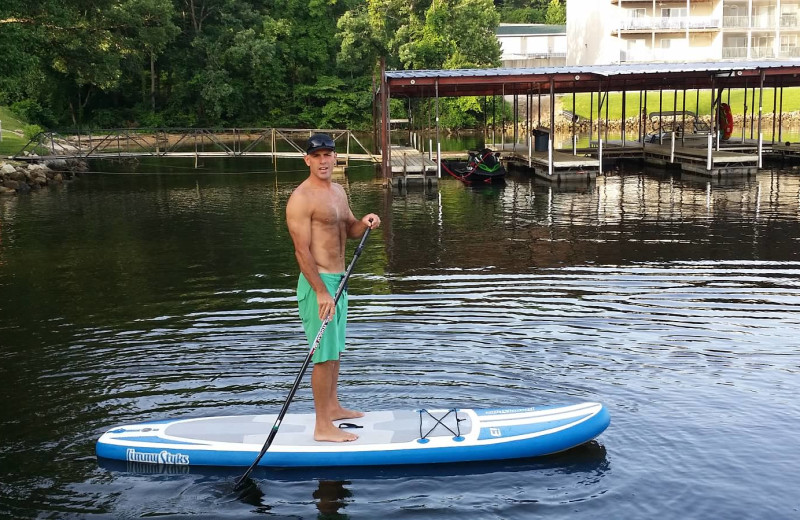 Paddle boarding at Lake Breeze Resort.
