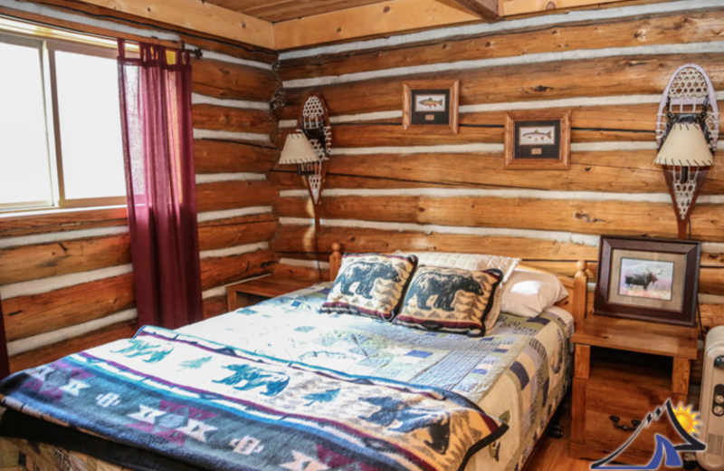 Cabin bedroom at Elk Lake Resort.