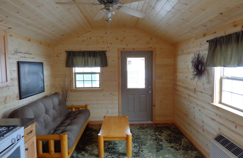 Cabin living room at Yogi Bear's Jellystone Park Gardiner.