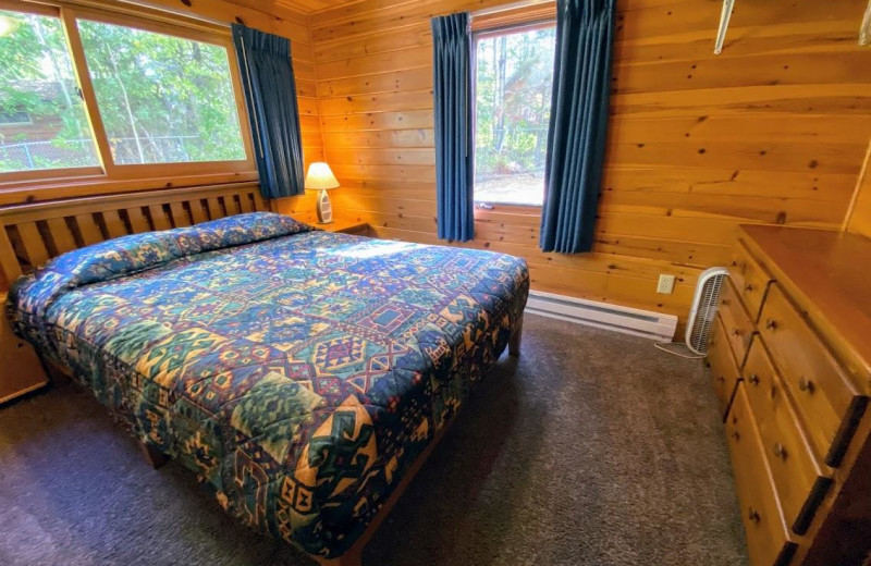 Cabin bedroom at Pehrson Lodge Resort.