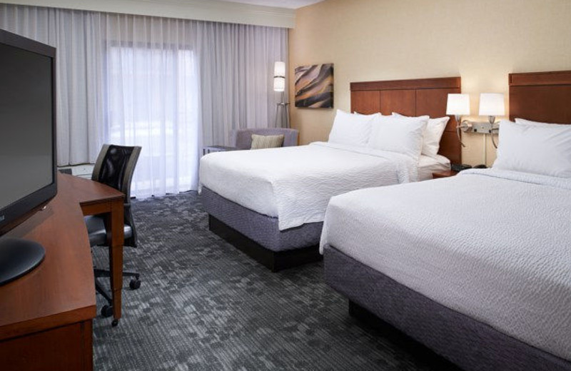 Guest room at Courtyard by Marriott Detroit Dearborn.