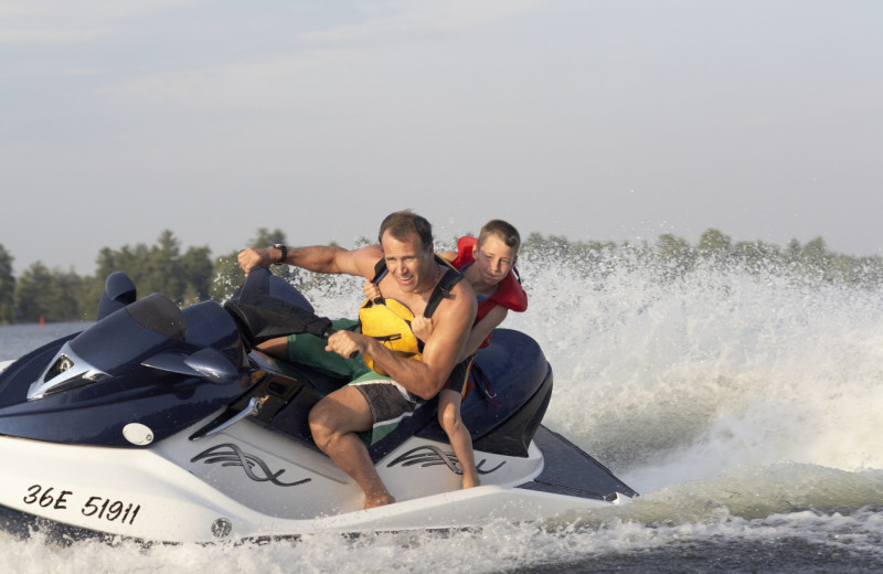 Family on jet ski at Holiday Inn Club Vacations at Orange Lake Resort.