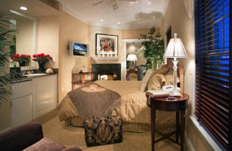 Guest room at The Chateau Inn & Suites.