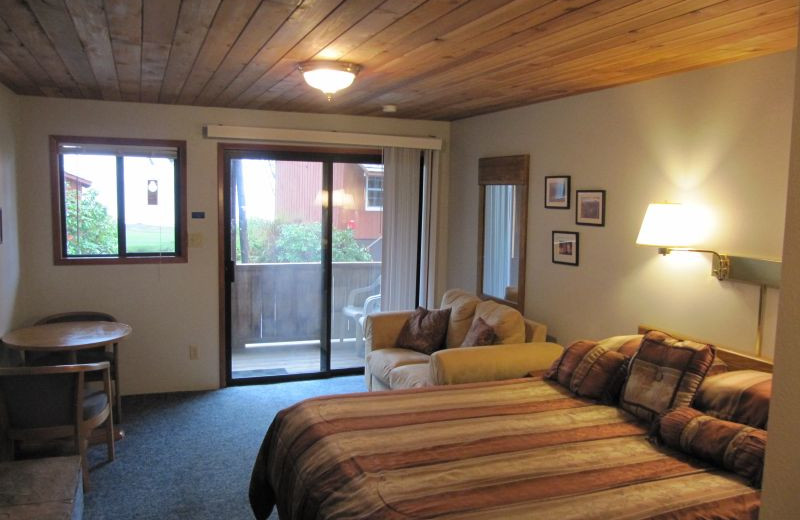 Cabin bedroom at Rain Forest Resort Village.