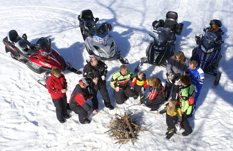 Snowmobiling at Wild Skies Cabin Rentals.