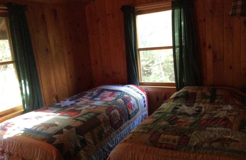 Cabin bedroom at Muskego Point Resort.