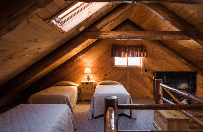 Cabin bedroom at Pitlik's Sand Beach Resort.