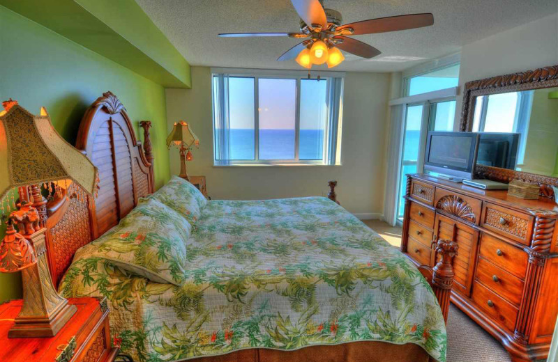 Rental bedroom at CondoLux Vacation Rentals.