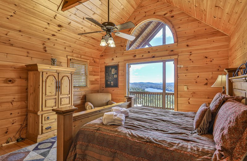 Cabin bedroom at Mountain Oasis Cabin Rentals.