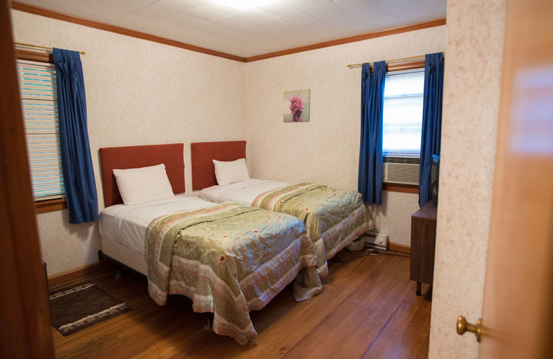 Cabin bedroom at Dunham's Bay Resort.