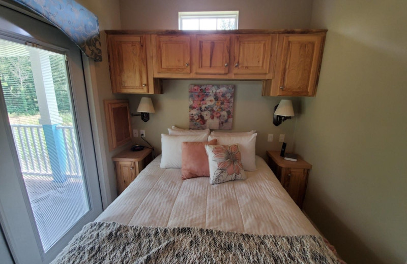 Cottage bedroom at Mill Creek Ranch Resort.