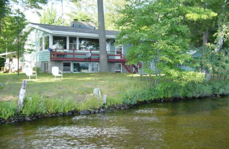 Cabin exterior at Whispering Pines Resort.