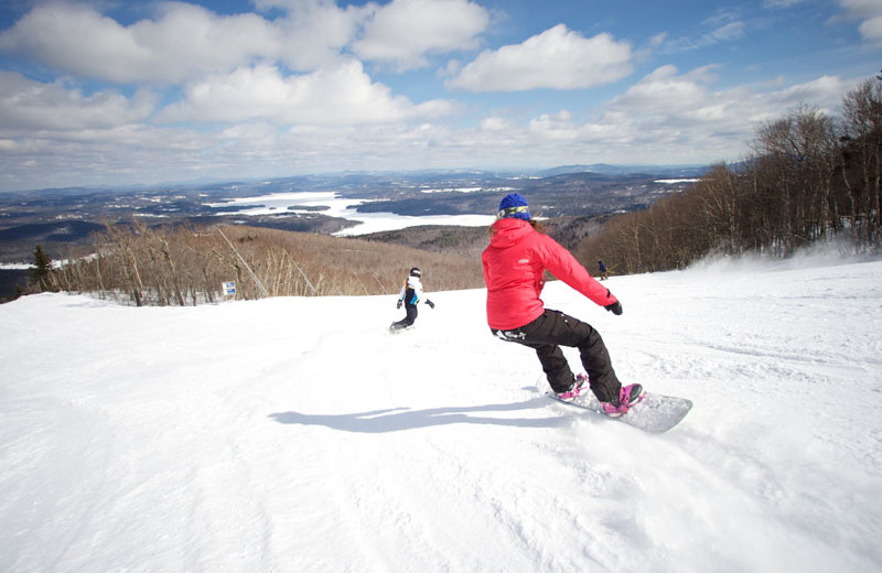 Snowboarding near Sunapee Harbor Cottages.