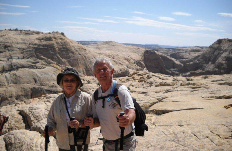 Couple hiking near Chateau Aprés Lodge.