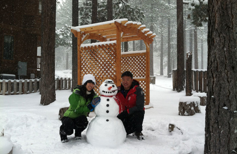 Family and snowman at Heavenly Valley Lodge.