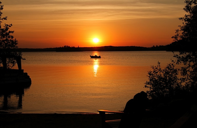 Sunset over the lake at Timber Trail Lodge & Resort.