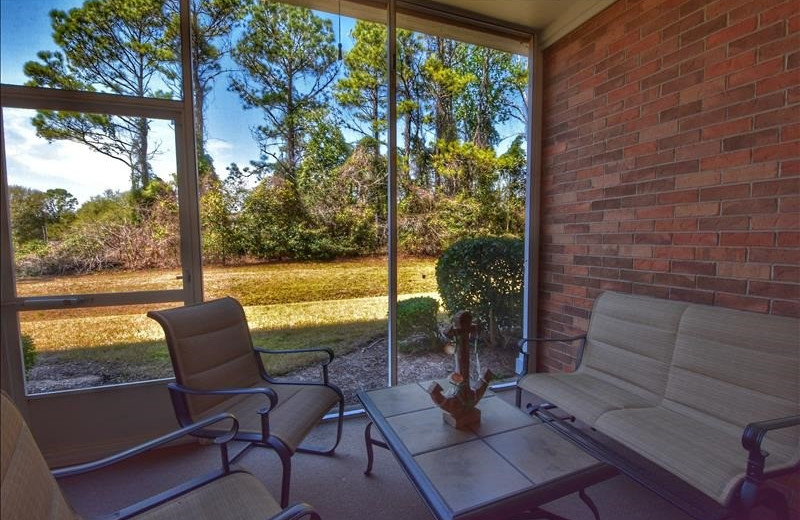 Rental patio at Barefoot Resort Rentals.