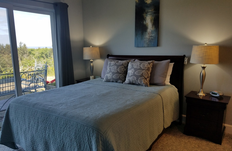 Rental bedroom at Oceanfront Getaways.