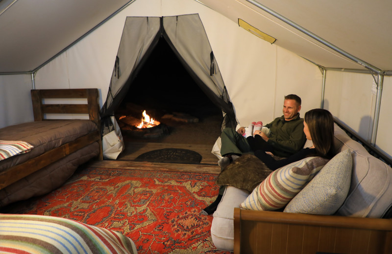 Couple in tent at Zion Ponderosa Ranch Resort.