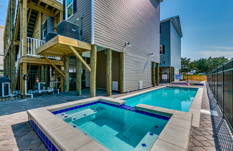 Guest outdoor pool at Together Resorts.