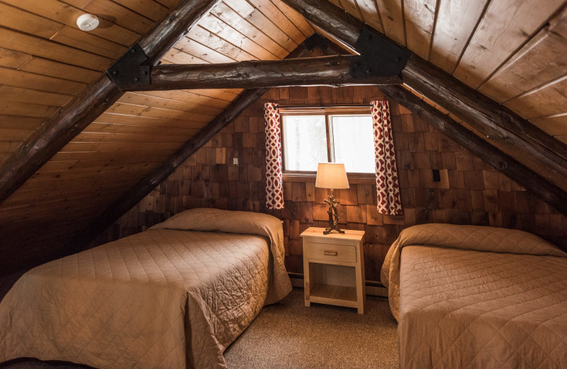 Cabin bedroom at Pitlik's Sand Beach Resort.