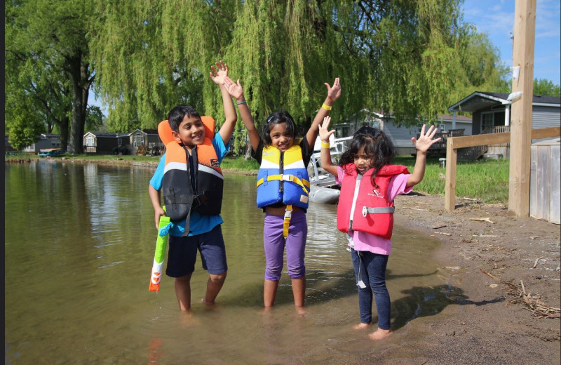 Family at Great Blue Resorts- Cherry Beach Resort.