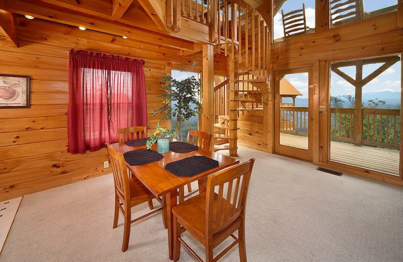 Cabin dining room at Timber Tops Luxury Cabin Rentals.