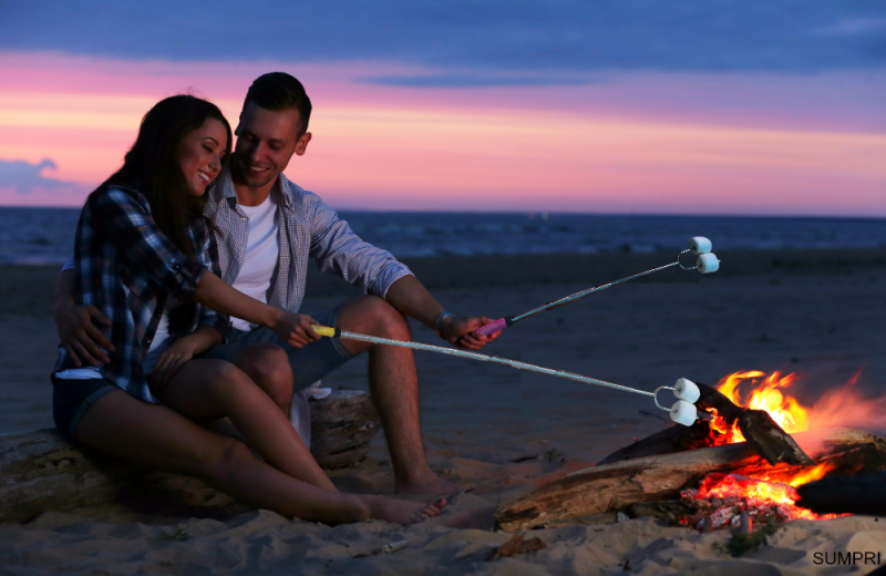 Couple on beach at Monterey Tides.