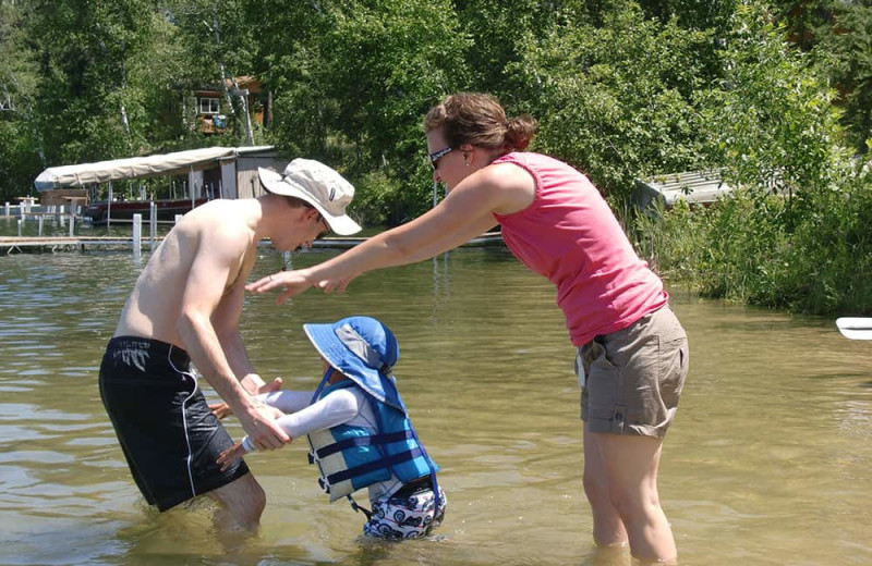 Family swimming at Knotty Pines Resort.