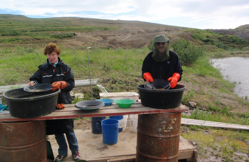 Panning for gold at AkAu Alaska Gold & Resort.