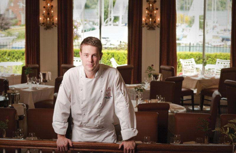 Chef in dining room at Queen's Landing.