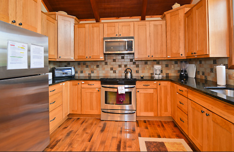 Cabin kitchen at Black Bear Resort Rentals.