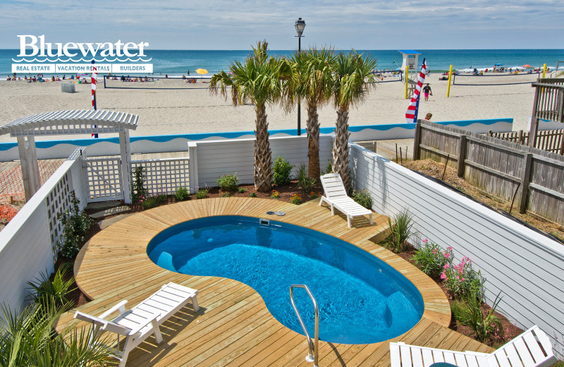 Rental pool and beach at Bluewater Real Estate.