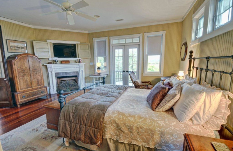 Vacation rental bedroom at Century 21 Action Inc.