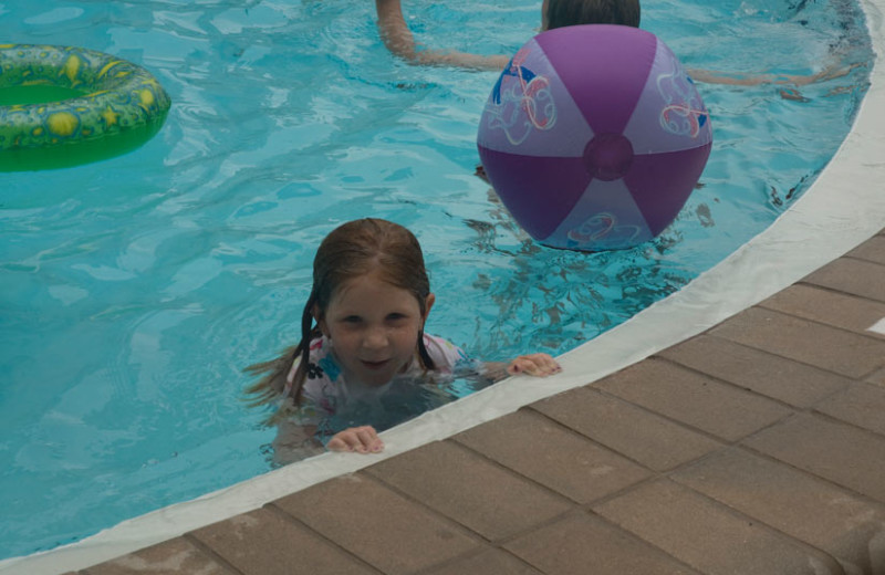 Kids playing in pool at Nautilus Condominiums.