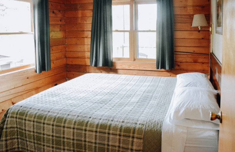 Cabin bedroom at Arkansas White River Cabins.