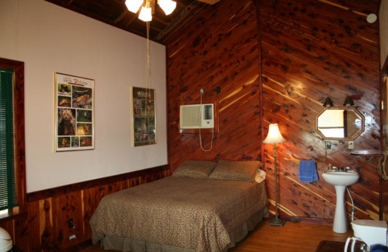 Cabin bedroom at The Exotic Resort Zoo