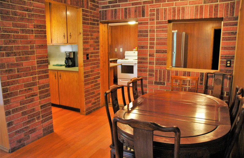 Cabin 15 Alder kitchen and dining at Gwin's Lodge & Kenai Peninsula Charter Booking Service.