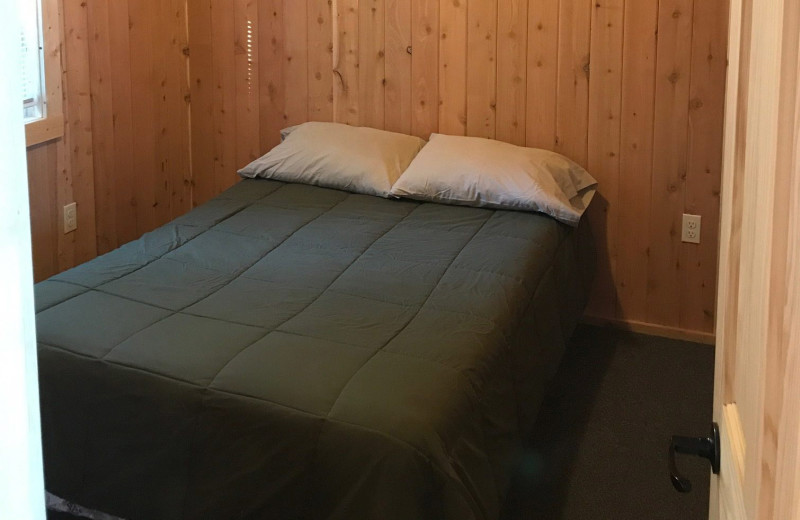 Cabin bedroom at Vacationland Resort.