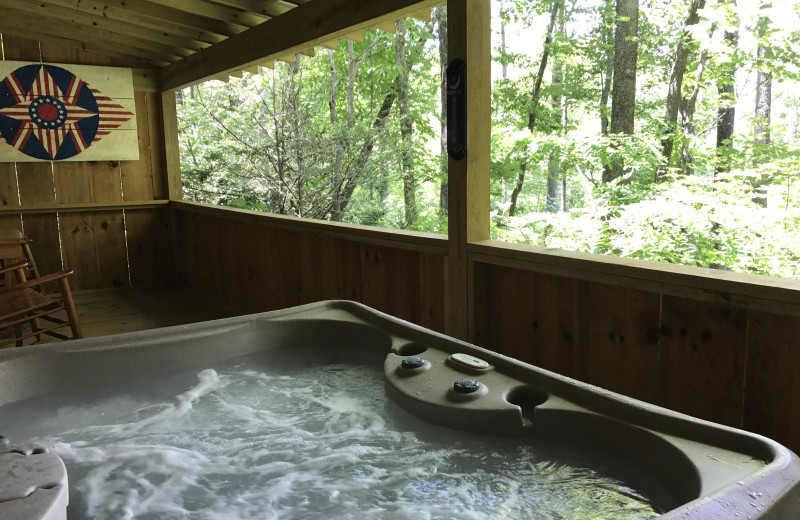 Cabin hot tub at Cabins of Asheville.