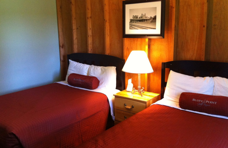 Cottage bedroom at Bluff Point Golf Resort.