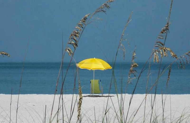 Relax on the beach at Sunset Vistas.